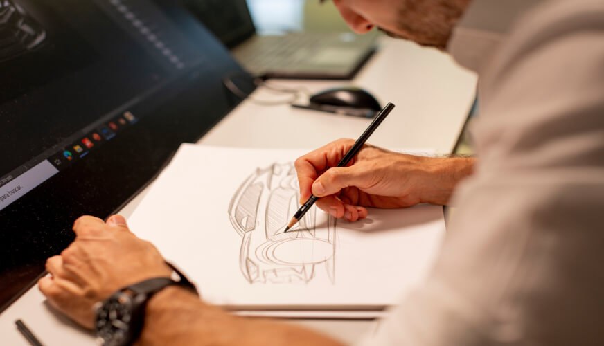 The process of creating a car begins with a sketch.