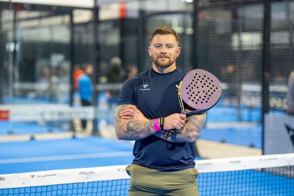 Adam Peaty playing padel.