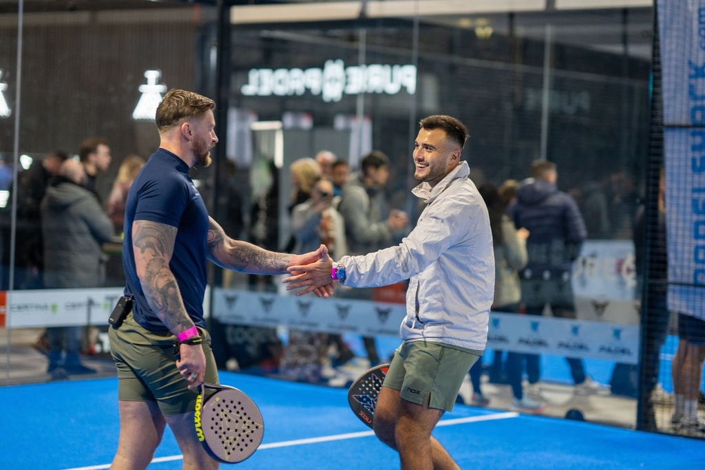 Adam Peaty and Louie Harris playing padel