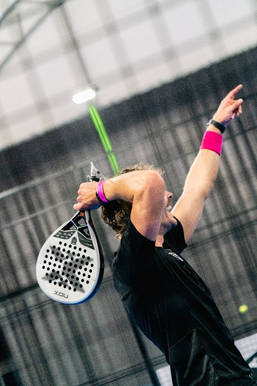 A padel player celebrating a win at the Pro Am Padel Tour 2025