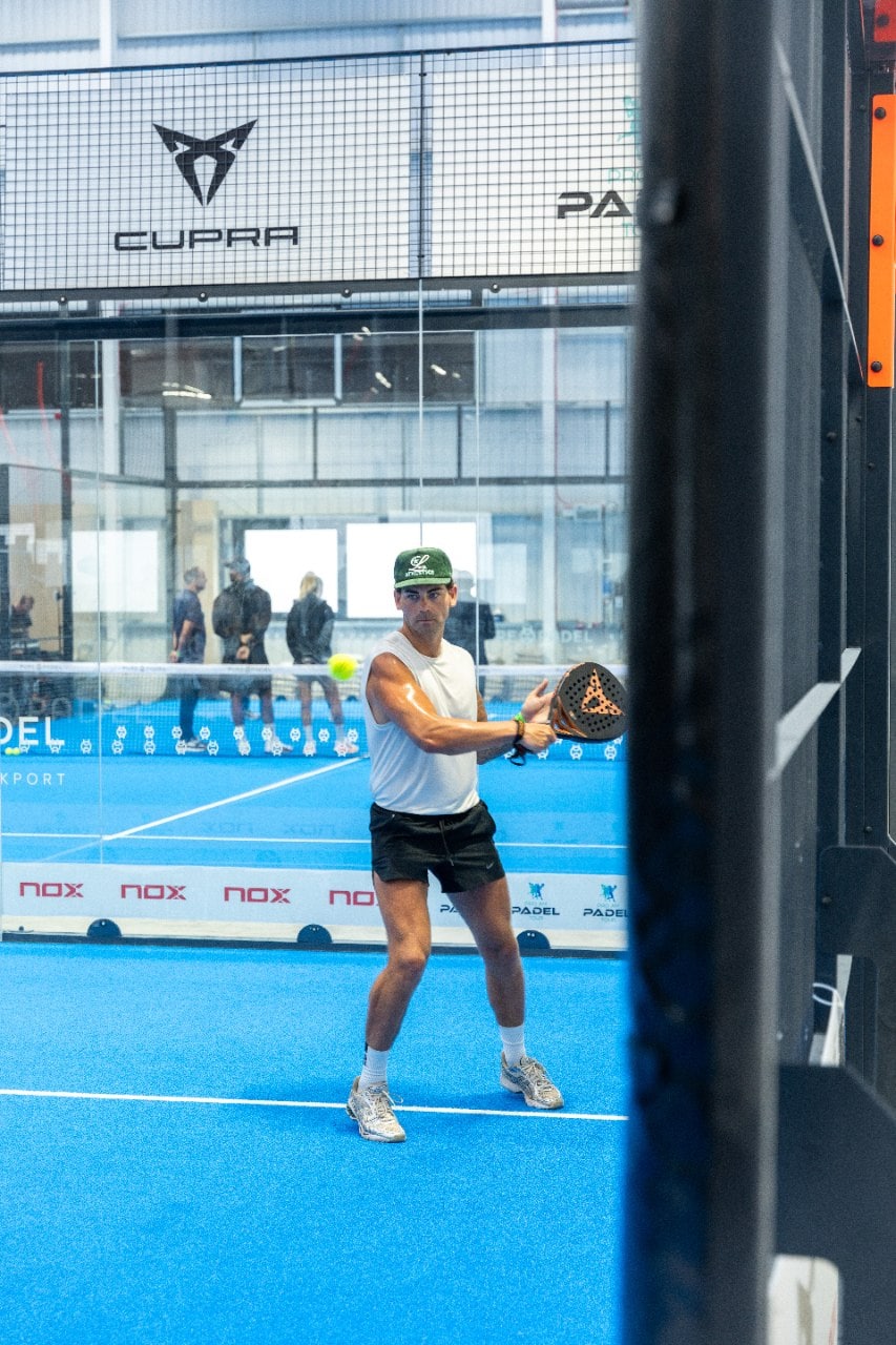 A padel player mid-game during the Pro Am Padel Tour 2025