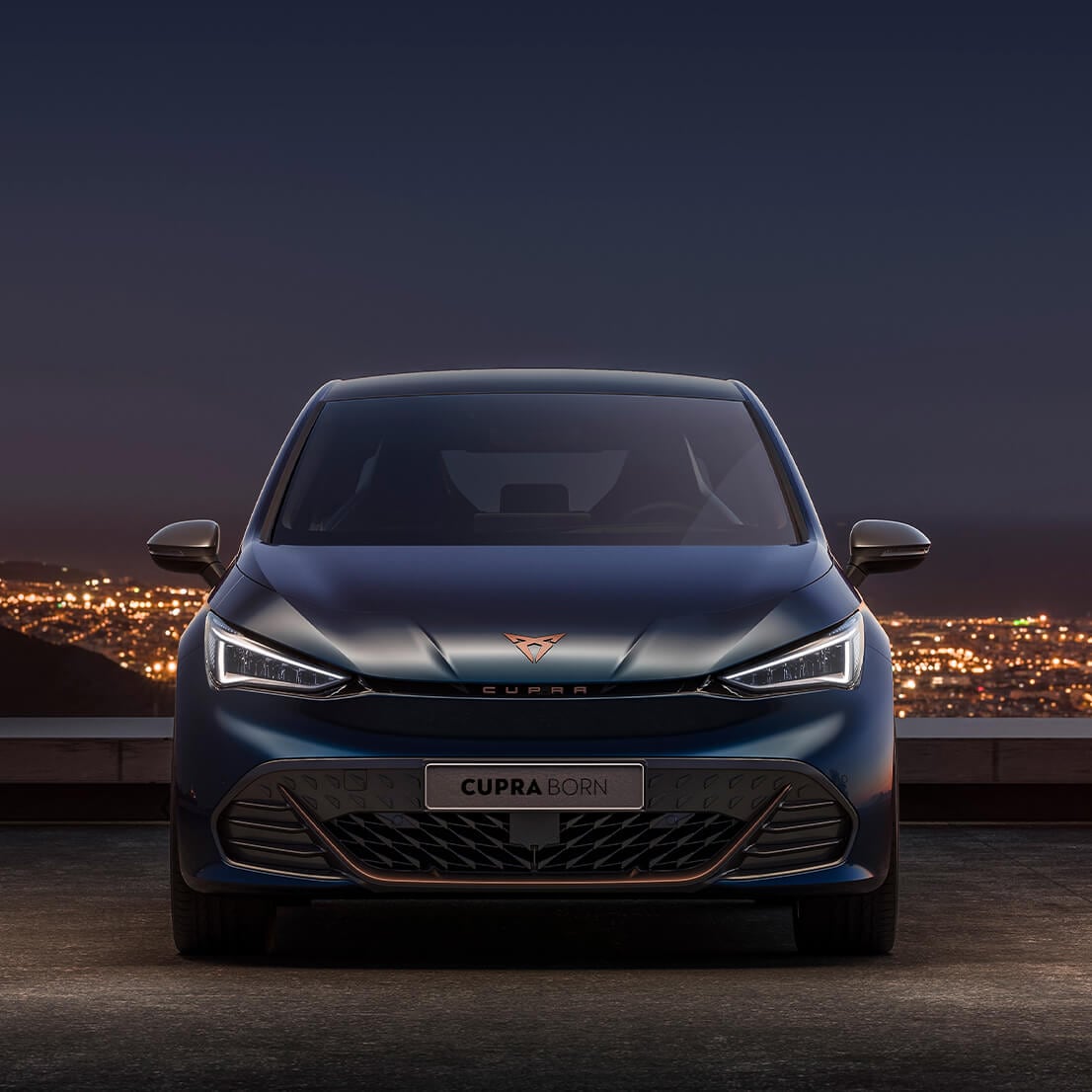 Front view of the CUPRA Born at night