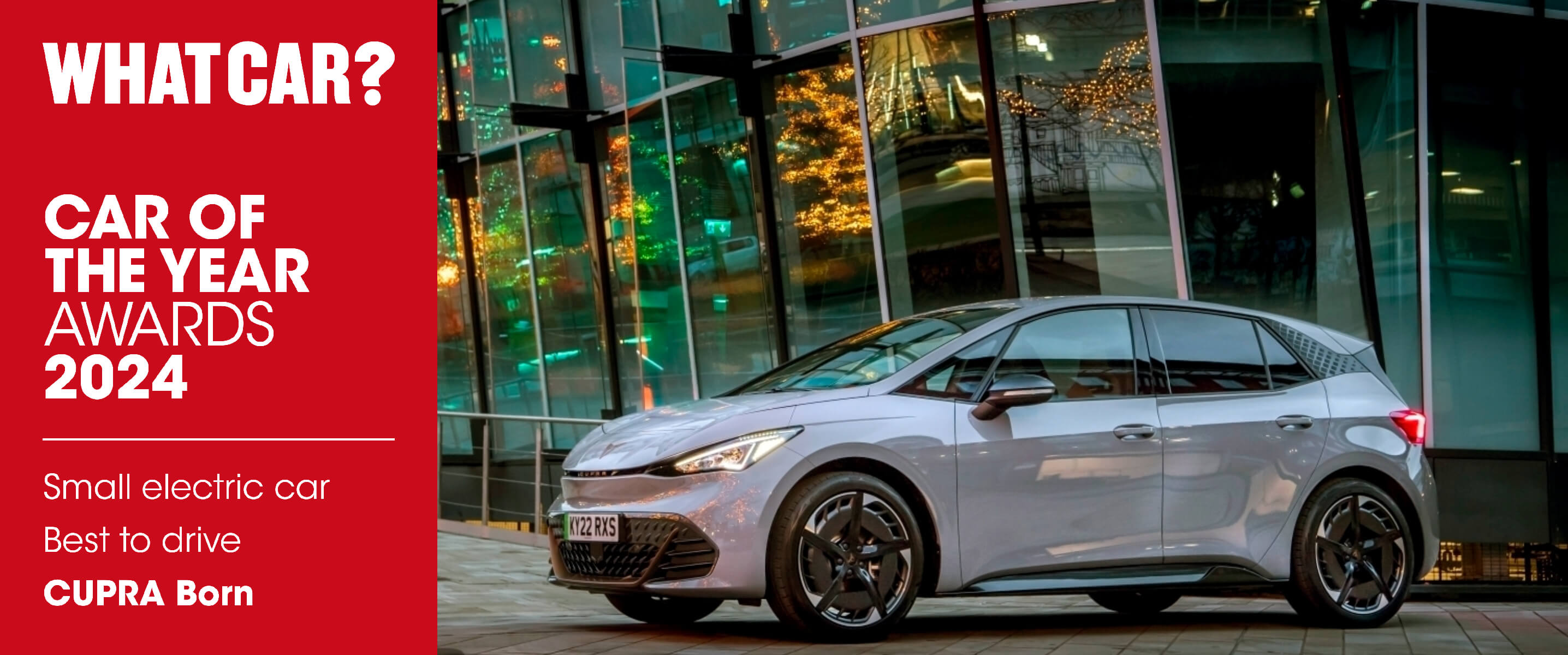 CUPRA Born in front of a building