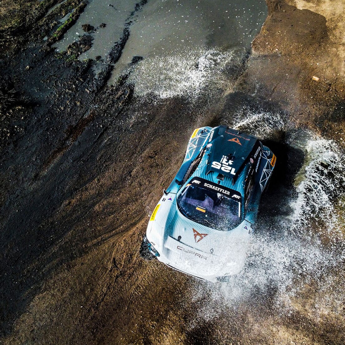 The CUPRA Tavascan XE on a gravel track