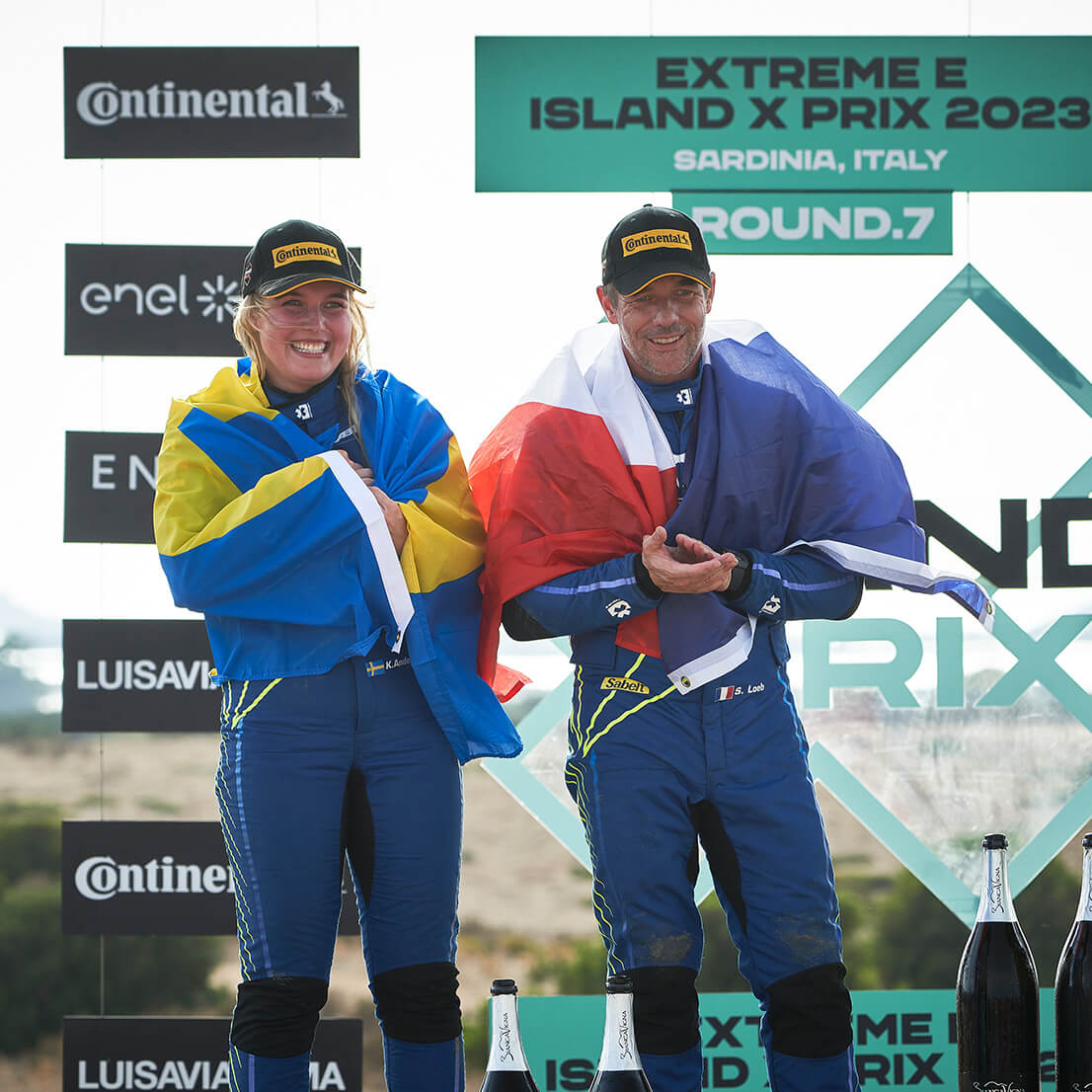 Klara Andersson and Sébastien Loeb celebrating a double podium finish