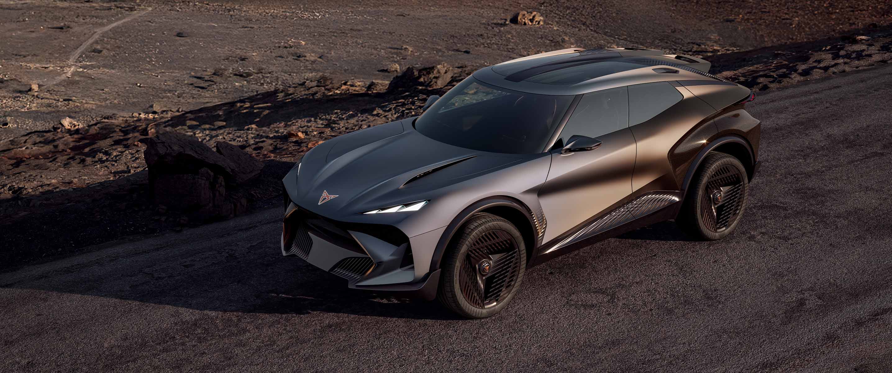 New CUPRA Tindaya Showcar in a sleek matt grey colour on the side of a mountain