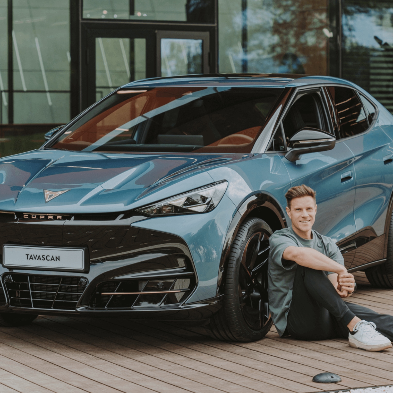 FC Barcelona’s captain Marc ter Stegen poses next to CUPRA Tavascan