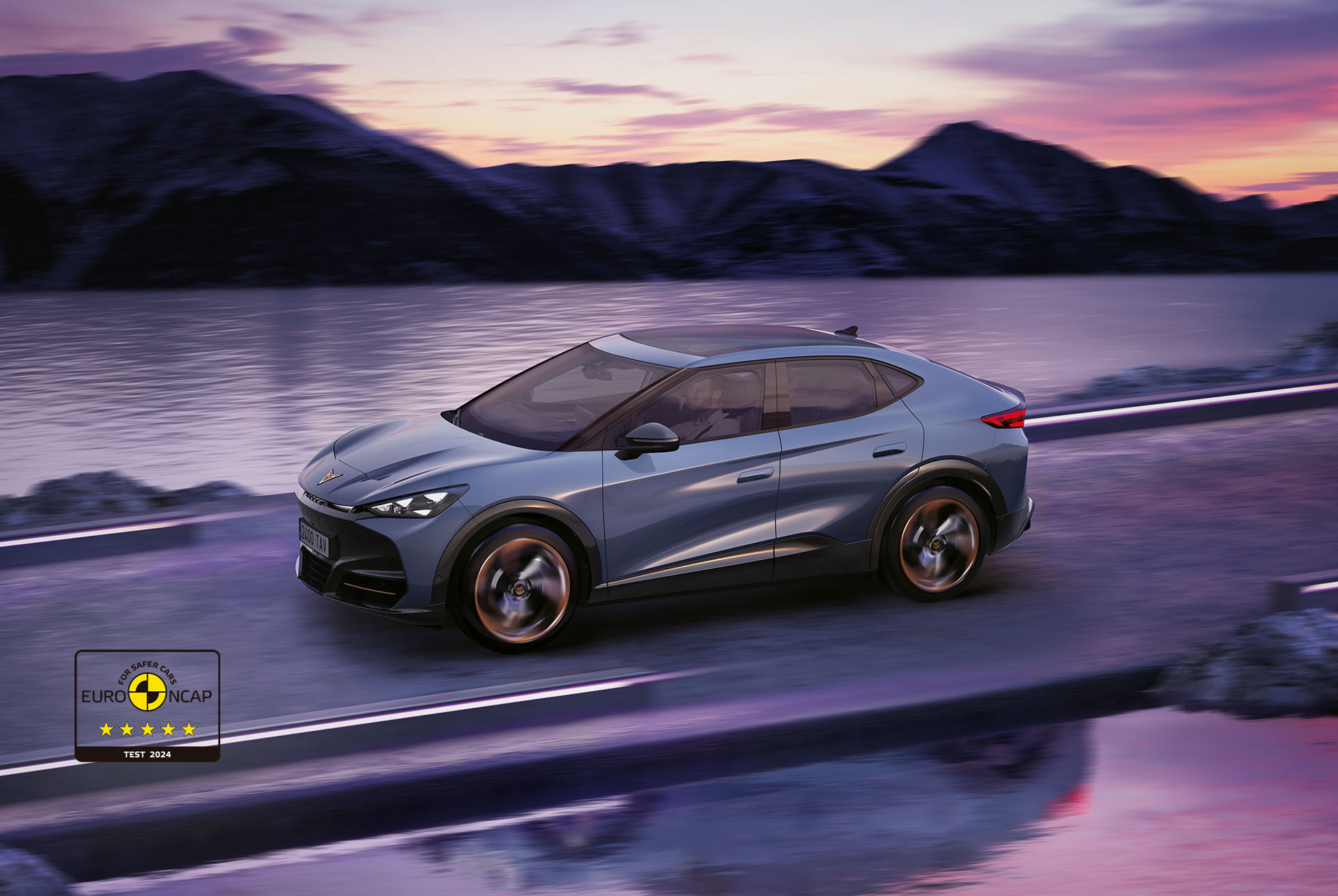 CUPRA Tavascan car driving on a mountainous road, in the bottom left corner we see a five star euro ncap safety rating logo