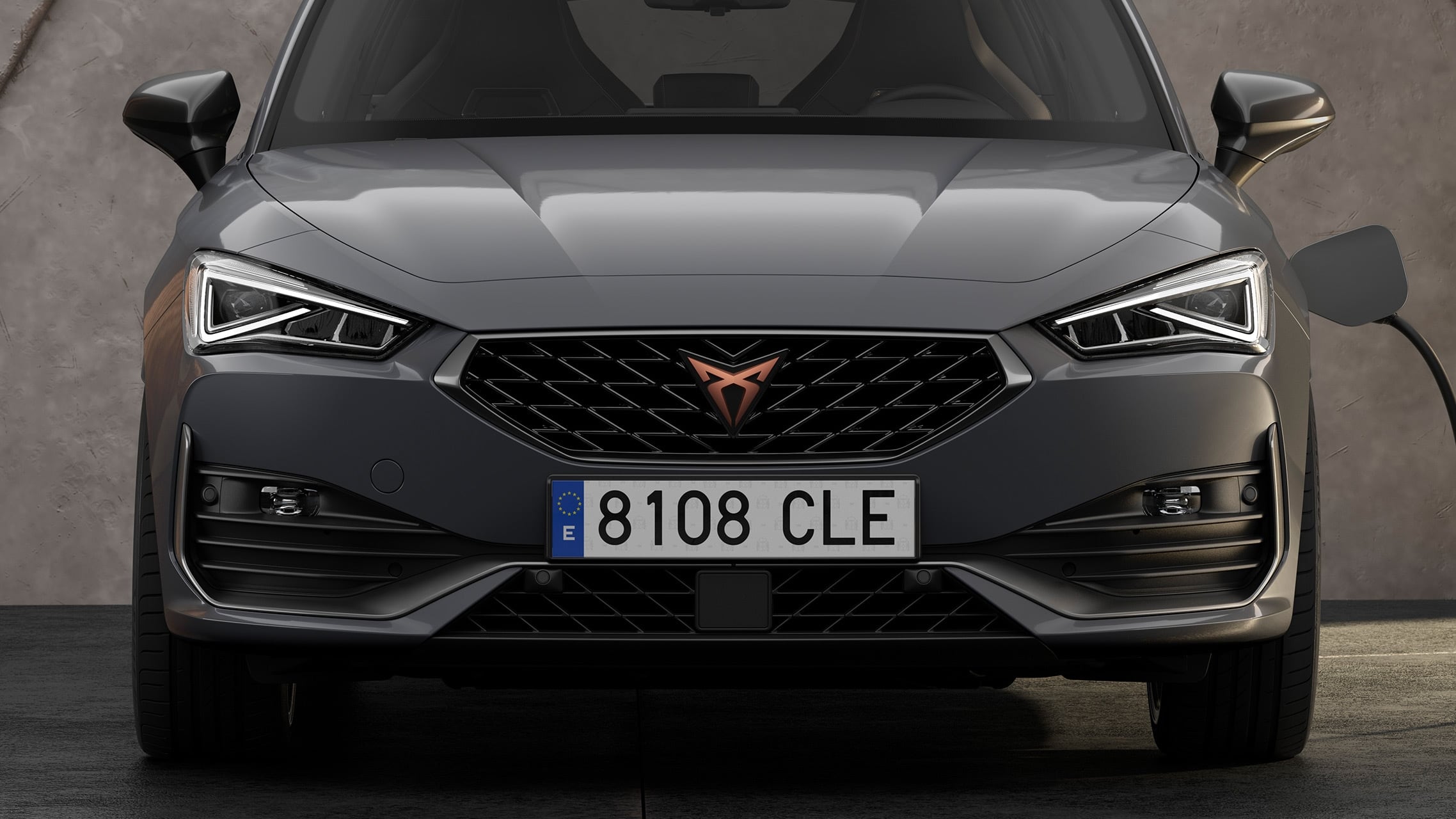 new CUPRA Leon Estate e-HYBRID Family Sports Car closeup view of front grille with dark aluminium details