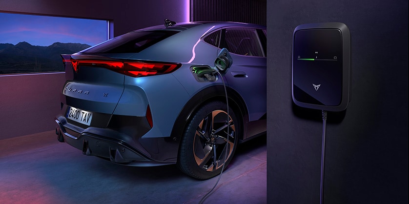 A CUPRA Formentor and a charging station
