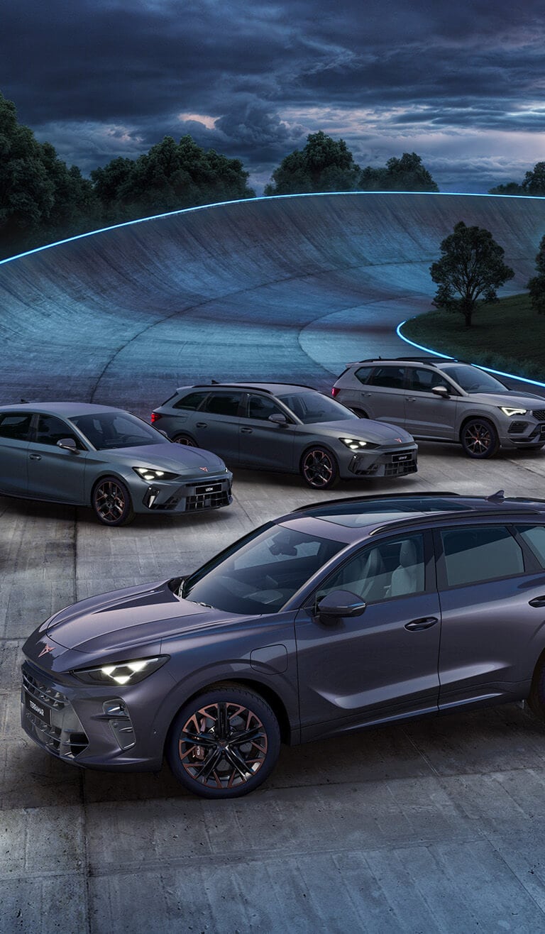 The CUPRA range of cars: Tavascan, Formentor, Leon, Leon Estate, Ateca and Born - parked on a curved road