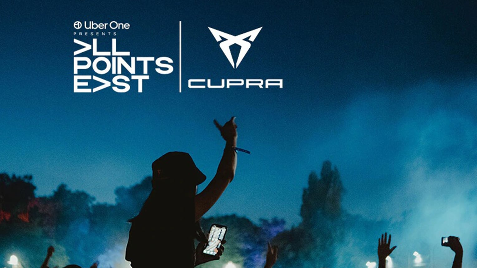 All Points East logo and the CUPRA logo with a crowd holding their hands up at the music festival