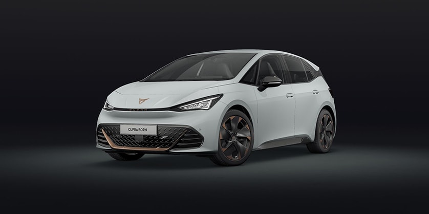 A white CUPRA Born on a dark background