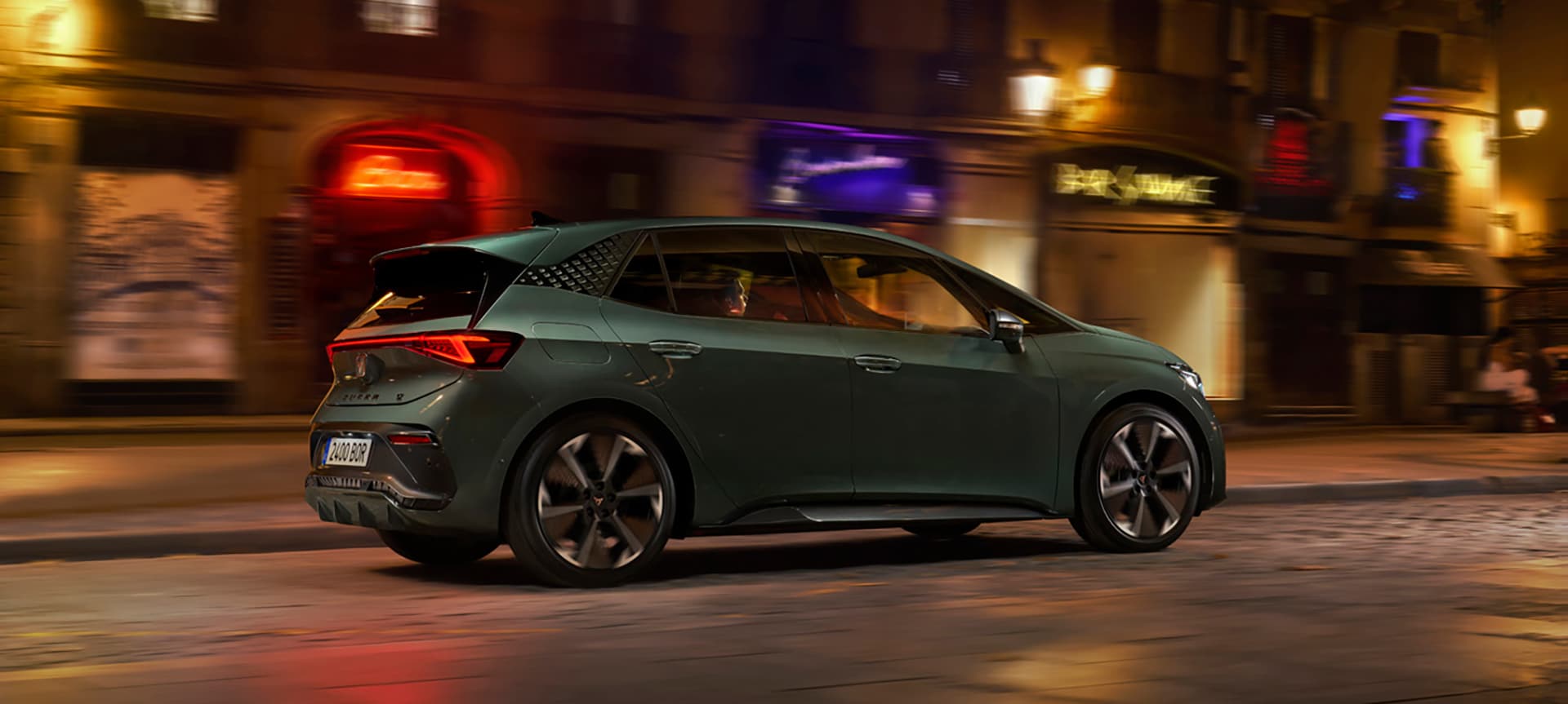 A CUPRA Born being driven on a road