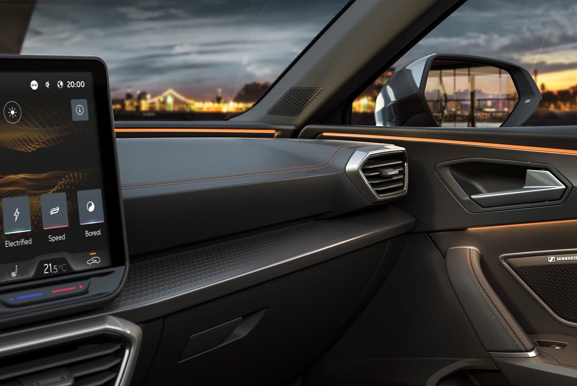 New infotainment system inside the CUPRA Leon, dashboard interior, wing mirror, air vent and glove compartment.