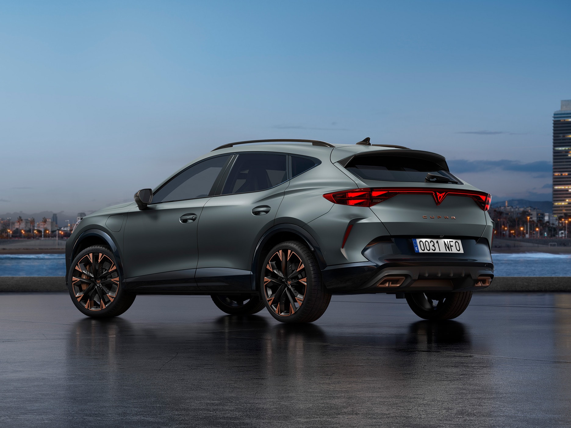 CUPRA Formentor three quarter rear design parked in an outdoors setting, with the city’s skyline in the background.