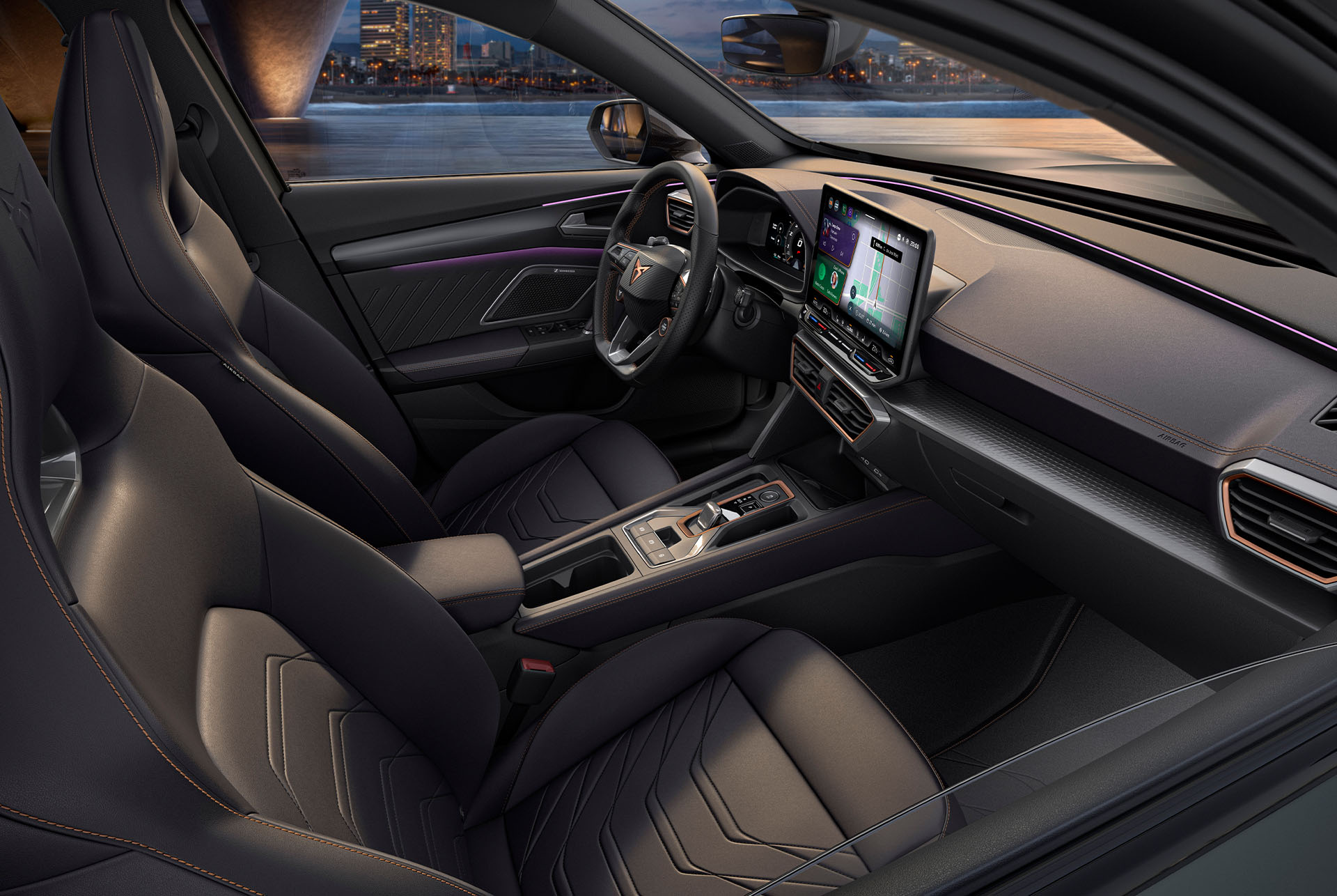Angle shot of the driver and passenger bucket seats, upholstered in authentic black leather. These seats are part of the VZ2 trim for the CUPRA Formentor.