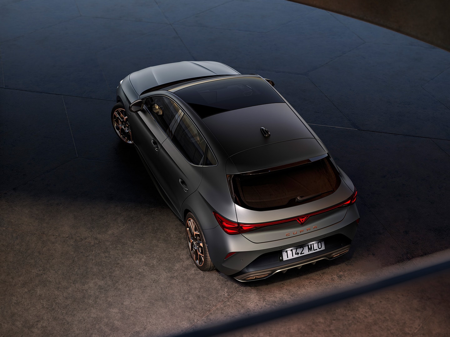 Upper rear-view of the CUPRA Leon, showcasing its exterior design lines.