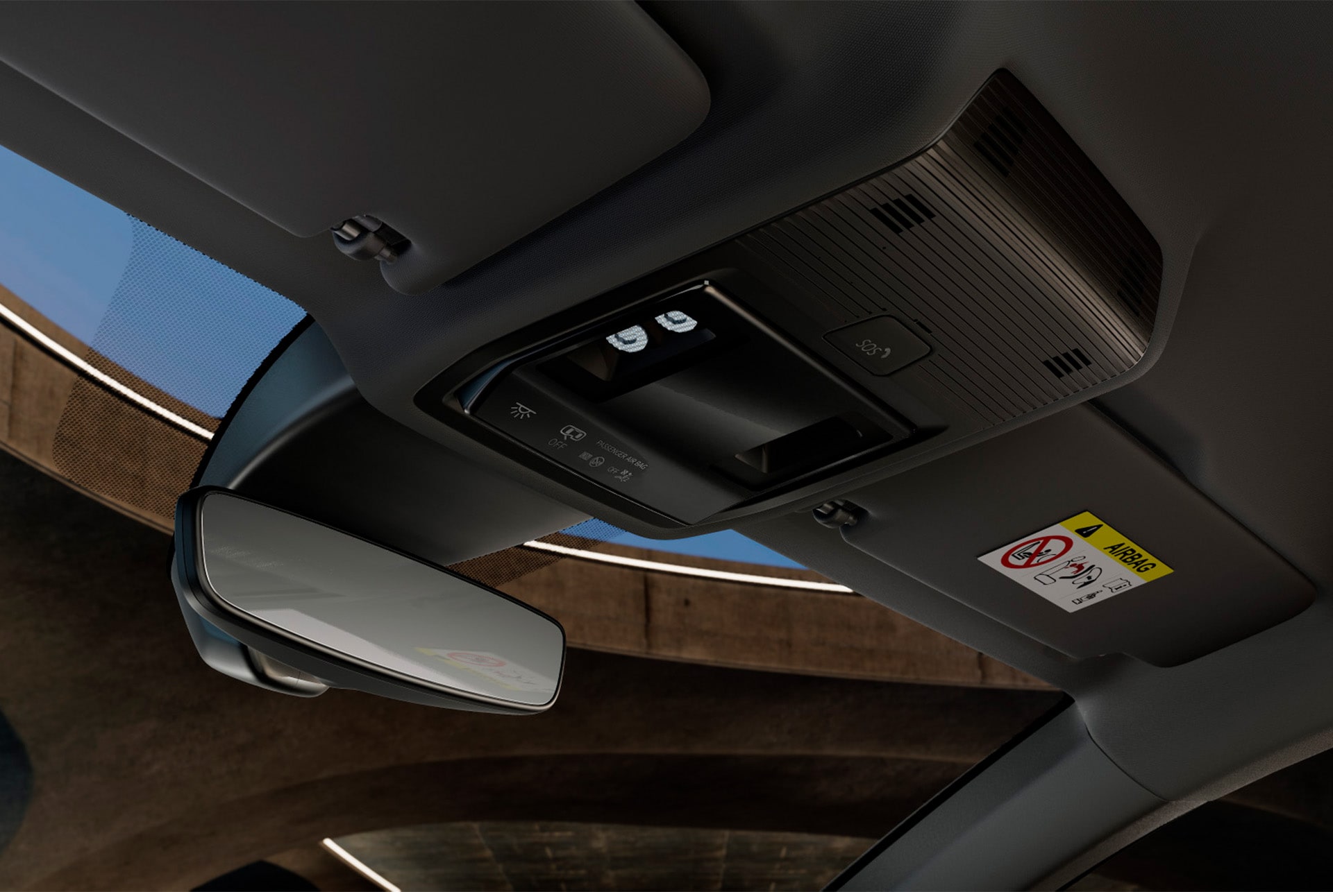 Interior view of a CUPRA Leon Estate car showing the overhead console with a wing mirror, LED car cabin lights,  various controls and cupra connectivity features, including an SOS emergency button.