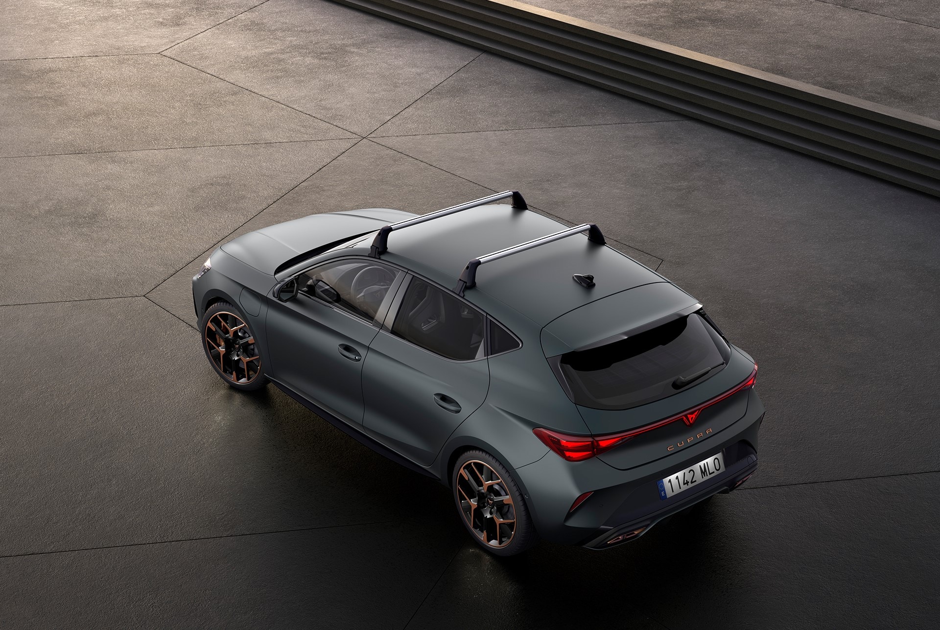 Bird’s eye view of new enceladus grey matt CUPRA Leon with thule car roof bars installed