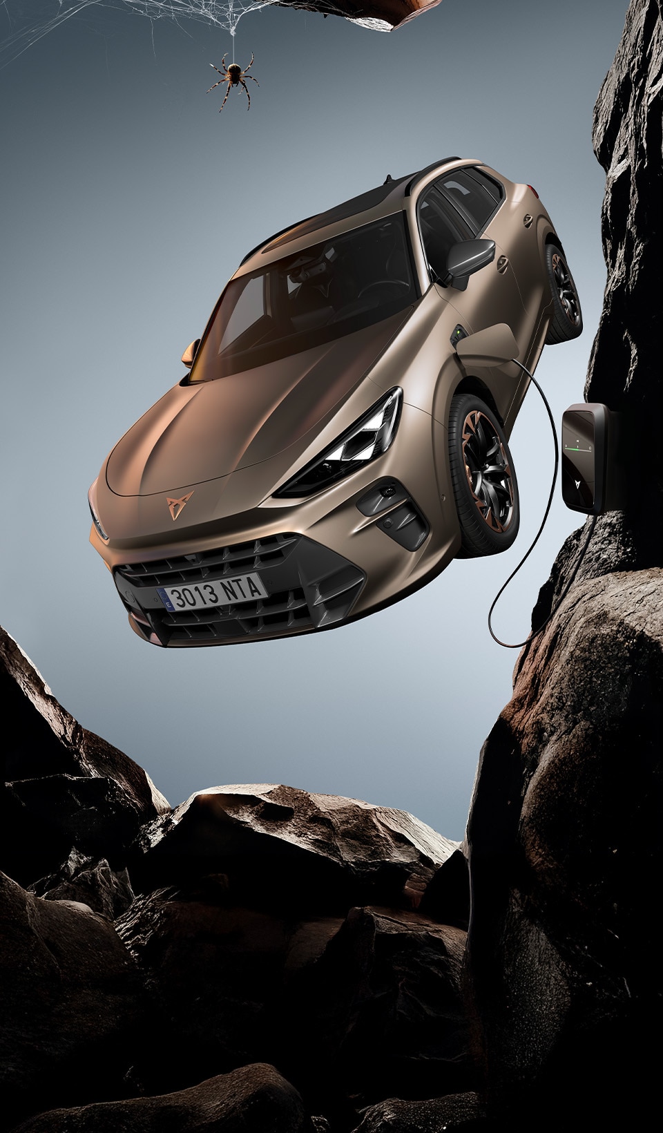 A CUPRA Terramar SUV shown from a high angle, appearing to be in motion with a red light streak extending from its side to a person lying horizontally in the air next to it